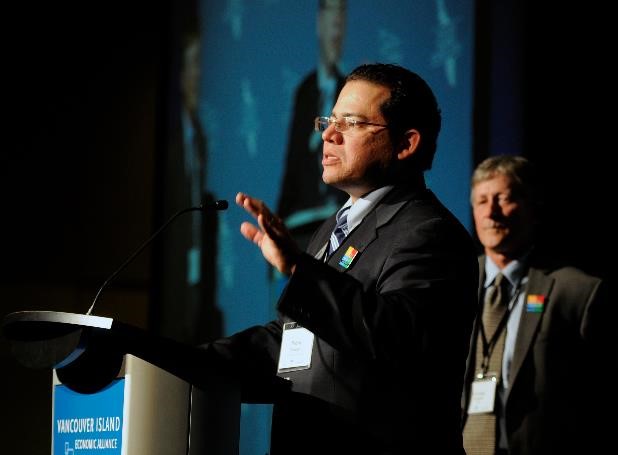 Pedro Marquez announcing VI 2065 at the 2013 Economic Summit (VIEA President, George Hanson in the background)