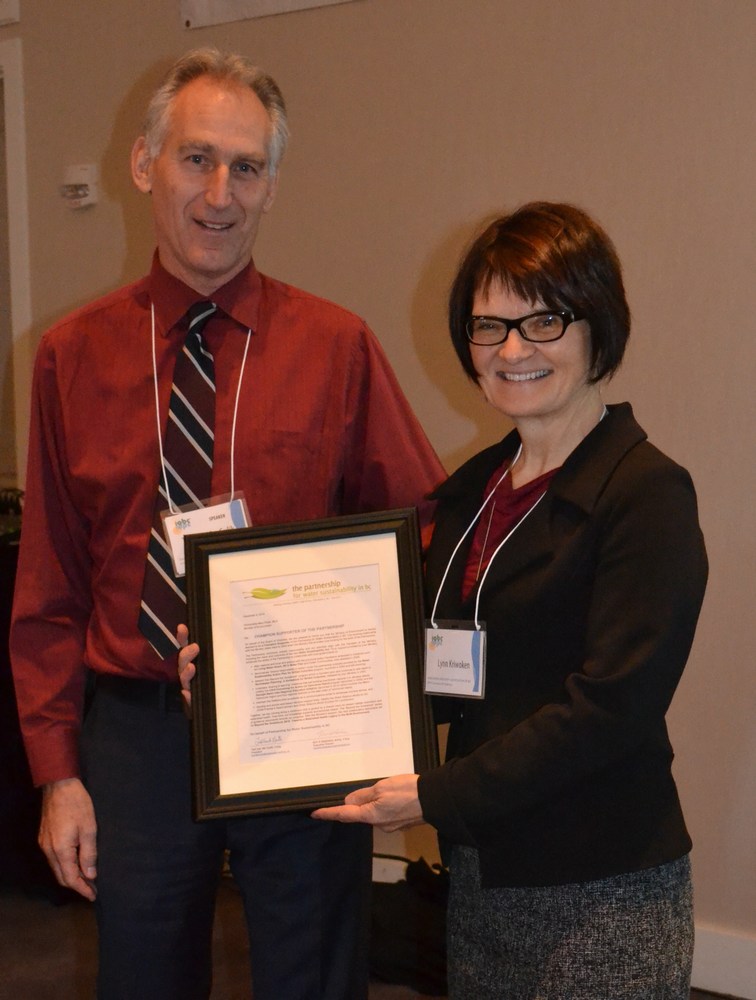 Ted van der Gulik (L), President of the Partnership for Water Sustainability in BC, presented the framed “Champion Supporter recognition” to Lynn Kriwoken (R), Executive Director (Water Protection & Sustainability) in the BC Ministry of Environment